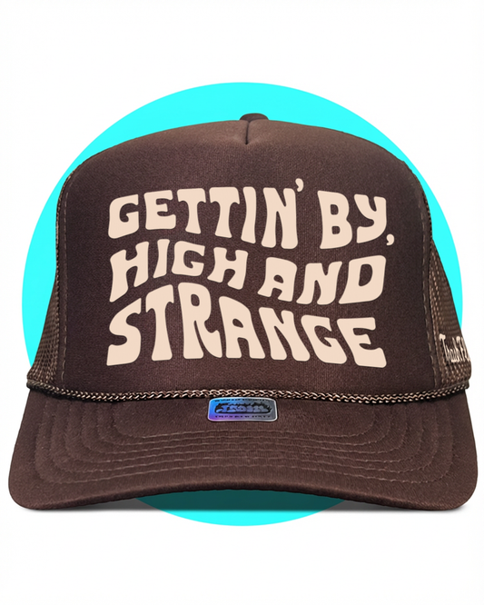 Gettin By Gettin High and Strange Trucker Hat
